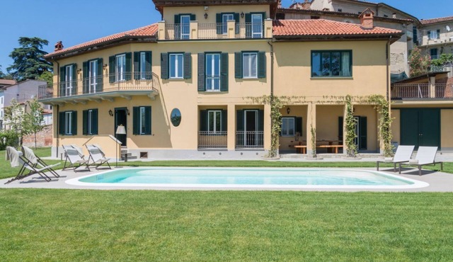 GuestHost - Elegant and spacious villa perfect for accommodating up to 12 guests is located in the center of Vignale in the heart of Monferrato area, nominated a UNESCO World Heritage Site in 2014. The house is equipped with every comfort: WiFi, air cond