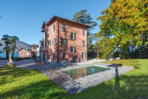 GuestHost - Lakeview Apt with Pool, Garden & Parking in Lierna