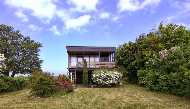 Stilt bungalow with lake view, holiday home by the sea, beach house in Großenbrode