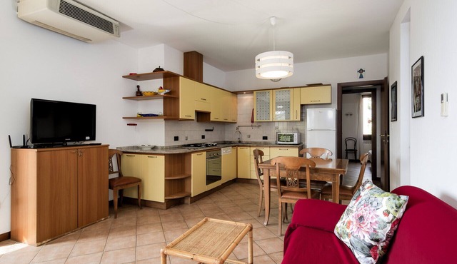 Top location condo with pool, lake view and walk to the beach
