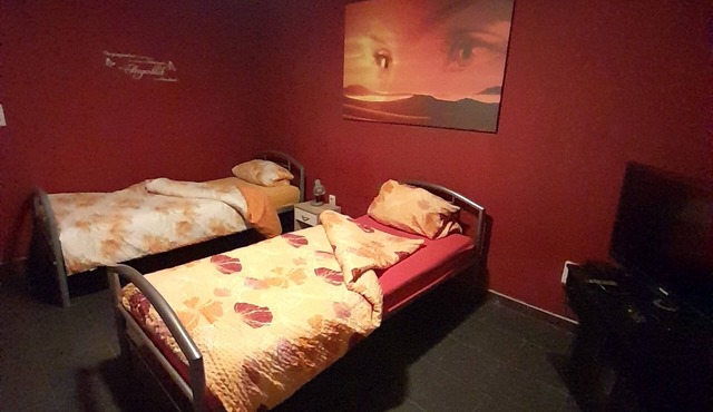 Worker's quarters with 3 single beds, a kitchen, and a bathroom; Wi-Fi in PS