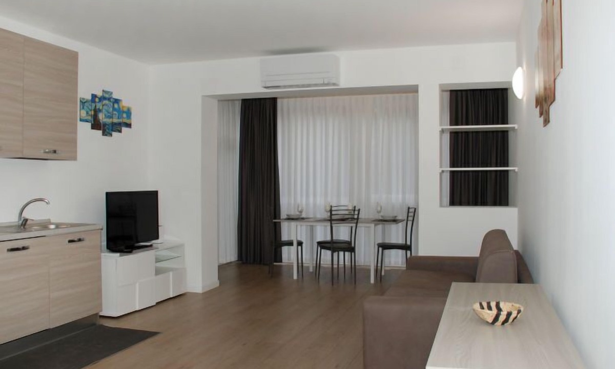 Bissone Apartment | Charming Gardenview App. 105 by Interhome