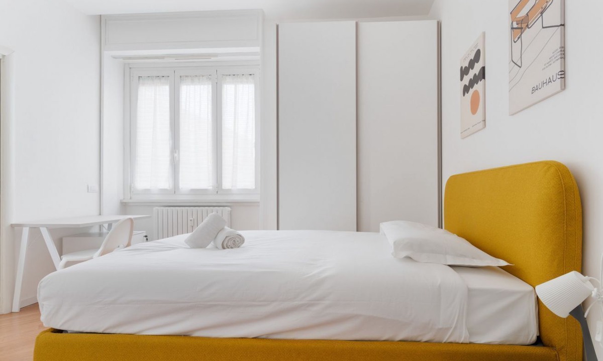 San Vittore Apartment | GuestHost - A modern and spacious 142 square meters apartment, perfect for five people, located on the second floor of a building with an elevator (NOT accessible to guests with disabilities).The property is just steps from the S. Agostino metro station,