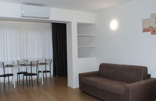 Bissone Apartment | Charming Gardenview App. 105 by Interhome