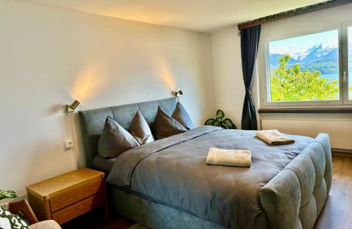 Oberhofen am Thunersee House | Spacious house for 11 persons with hot tub and fully equipped kitchen