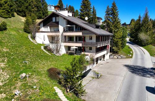 Valbella Apartment | Apartment with Fireplace & Mountain View