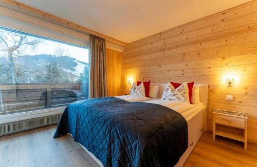 Saanen Apartment | BaseCamp - Renovated apartment with sunny balcony by Heiti Gstaad