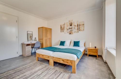 Porrentruy Apartment | The 5 Continents I & II - 320 m2 by Stay Swiss