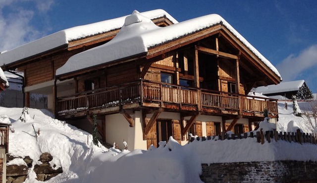 Chalet Renard Blanc is a luxurious yet cosy home for skiing , golf and hiking.