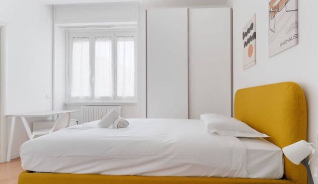 GuestHost - A modern and spacious 142 square meters apartment, perfect for five people, located on the second floor of a building with an elevator (NOT accessible to guests with disabilities).The property is just steps from the S. Agostino metro station,