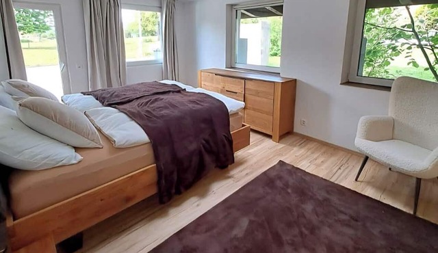Apartment with big garden, two firepits and 5 minutes from the lake
