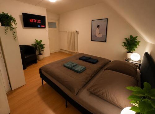 Room near the train station with large kitchen