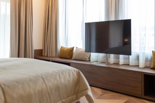 Hôtel des Innovations - Hôtel & Appartements - Votre séjour entre Fribourg, ville médiévale et La Gruyère et ses Bains